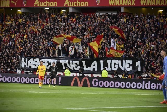 Lens fans display powerful banner against psg president al-khelaïfi