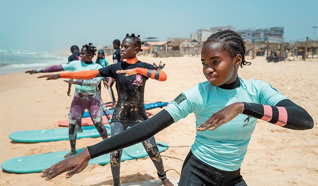 Surf and education empower young women in Dakar