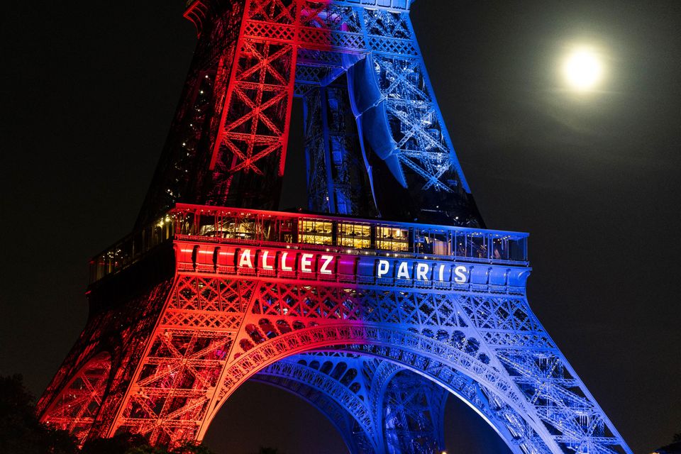 The Eiffel Tower illuminated in team colors ahead of the final