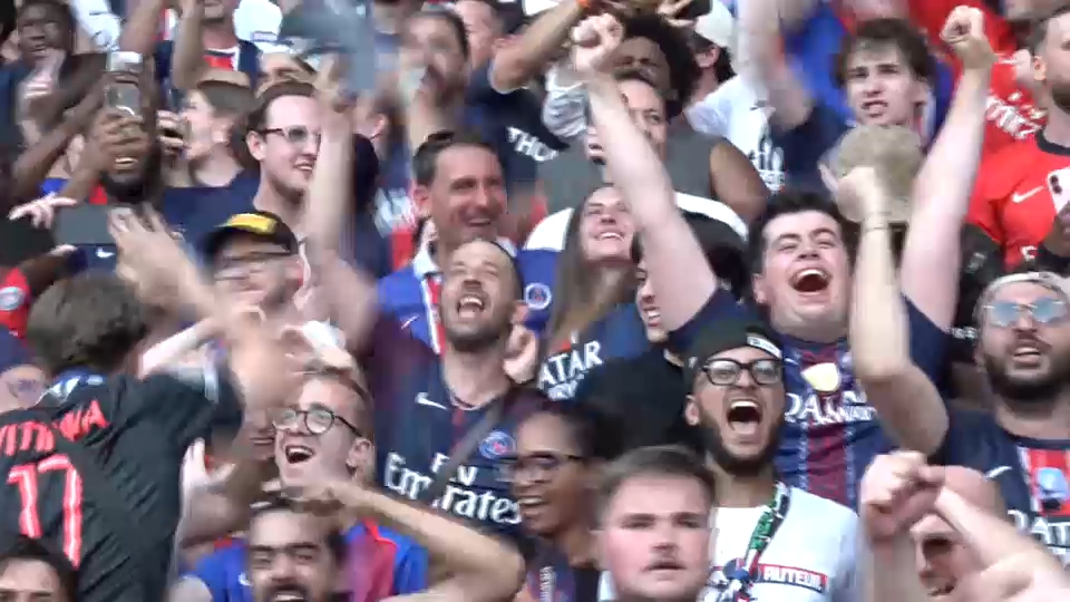 PSG supporters celebrating at Parc des Princes