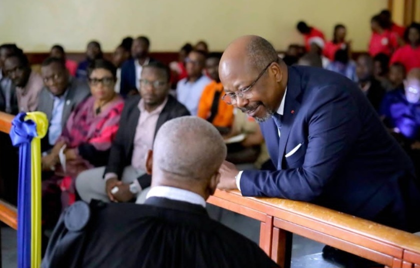Alain-Claude Bilie By Nze with his lawyer during a social media trial