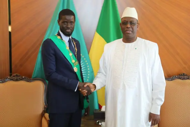 President Bassirou Diomaye Faye (left) and former President Macky Sall (right) at the 2024 inauguration ceremony in Dakar