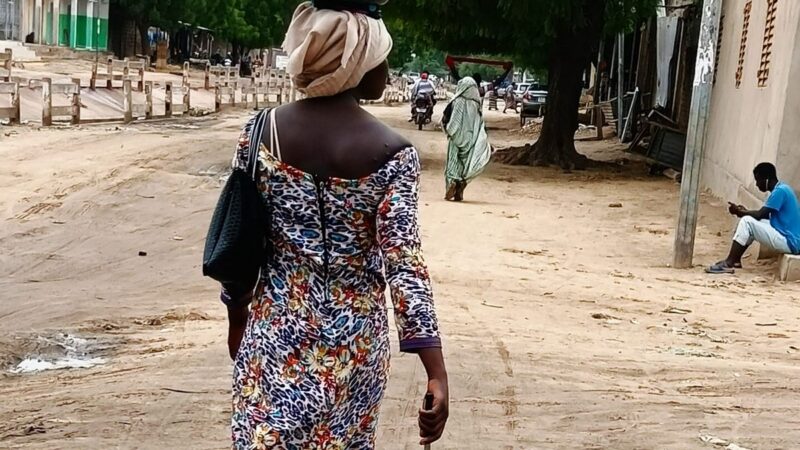 Léa sells cassava during break to finance schooling in N’Djamena