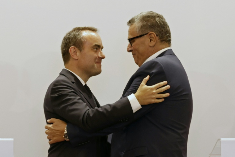 French Prime Minister Sébastien Lecornu (left) and Moroccan Prime Minister Aziz Akhannouch embrace at a joint press conference in Rabat