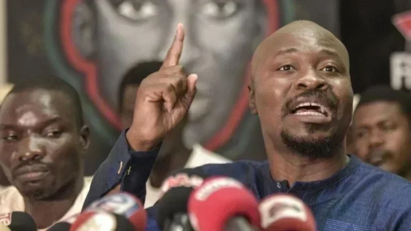 Portrait of Guy Marius Sagna speaking about political funds