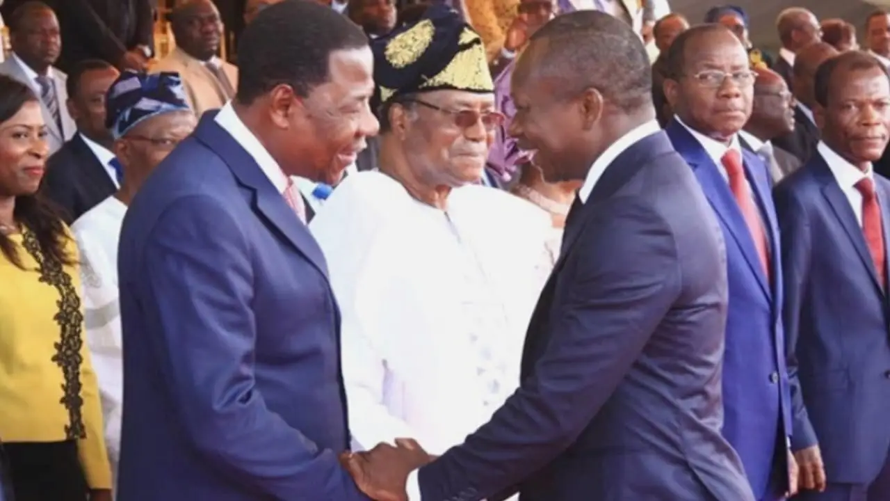 Former Presidents Nicéphore Soglo (background, in white), Boni Yayi (left), and incumbent Patrice Talon (right)