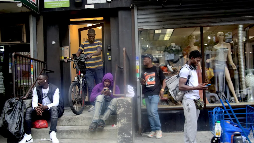 Migrants sitting together in a group