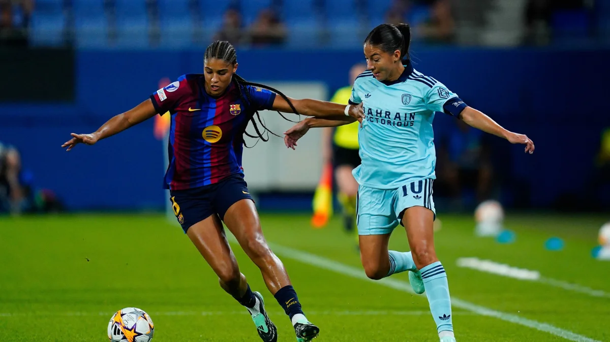 Barcelona players celebrating during the Women's Champions League match against Paris FC